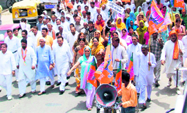 BJP activists hold a protest march against the hike in the prices of petroleum products in Sonepat on Thursday.