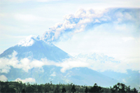 The Tungurahua volcano spews ash and rocks during an eruption in Banos, about 130 km southeast of Quito. Tungurahua, which means Throat of Fire, has been classified as active since 1999, and produced a strong eruption in 2008. It is one of eight active volcanoes in the country.
