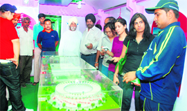 Visitors have a look at the stadiums design.
