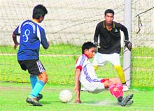 Players in action during a matc at the Dehradun District League in Dehradun on Friday. 