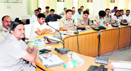 Uttarakhand and Uttar Pradesh police officials meet at a high-level meeting regarding upcoming Kanwar Mela at the CCR Tower in Haridwar on Friday.