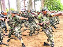 Police personnel undergo training to combat the Naxal menace at a camp in Latehar, Jharkhand, on Friday