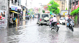 After rain lashes city, vehicles wade through water-logged roads at Kankhal in Haridwar on Saturday.