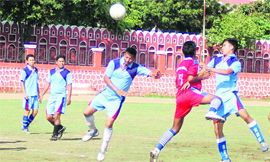 Players in action at the Dehradun Football League in Dehradun on Saturday.