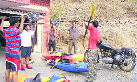 Kayaking enthusiasts get training by the River Explorers Group at Shivpuri near Rishikesh.