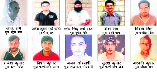 A poster carrying photos of the accused allegedly selling drugs to schoolchildren.