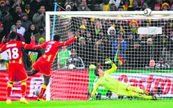Ghana's striker Asamoah Gyans (3) penalty kick hits the crossbar during their quarterfinal in Soweto on Friday