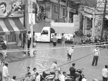 Commuters stranded at Dashmesh Nagar in Kharar on Sunday. 