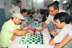 A chess match in progress at the BS Bisht Open Chess Tournament in Dehradun on Sunday