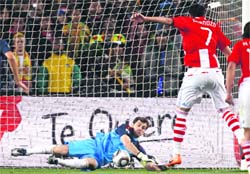 After three penalties, and a game dominated equally by either side, Iker Casillas and David Villa produce moments to take Spain to the semis, where Germany await them