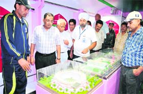 Officials take a look at the Special Exhibition Train Express in Haridwar