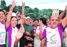 Chief Minister PK Dhumal with the Queens Baton at the Ridge in Shimla
