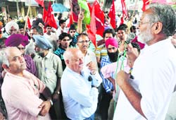 Activists of Left parties hold a protest in Ludhiana on Monday