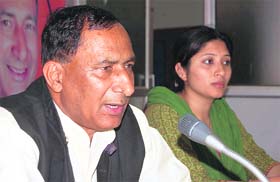 Bishan Singh Chufal, state president of the Uttarakhand BJP unit, addresses a press conference in Dehradun