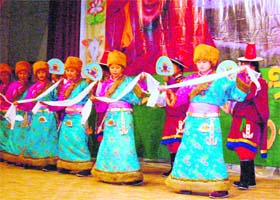 Tibetan students celebrate the 75th birthday of the Dalai Lama at the Tibetan Homes Foundation School at Happy Valley in Mussoorie