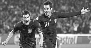 David Villa (L) holds the key for Spain in the semi-final today