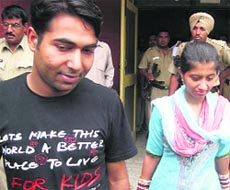 Manmohan and Shakti arrive at the City police station in Sirsa on Tuesday.