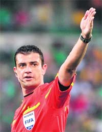 This file picture taken shows Hungarian referee Viktor Kassai during the Group A first round 2010 World Cup football match Uruguay vs Mexico at Royal Bafokeng stadium in Rustenburg