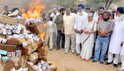 Seized medicines set on fire in the presence of health minister Laxmikanta Chawla