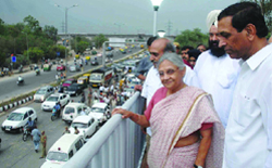 Chief Minister Sheila Diskhit with public works minister Raj Kumar Chauhan at the FOB on Mathura Road in New Delhi