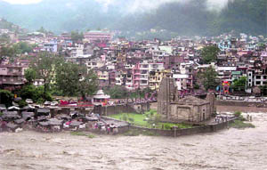 The Beas waters touching the danger mark at the historical Panchvaktar temple in Mandi on Wednesday.