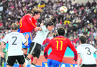 Spains Carles Puyol (C) scores during the World Cup semifinal against Germany at Moses Mabhida stadium in Durban on Wednesday. Spain beat Germany 1-0 to enter the final and set up a clash with the Netherlands for the title