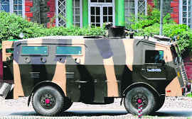 An Army armoured vehicle moves in Srinagar on Wednesday after the force staged a flag march.