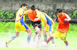 Players in action at the Lala Nemi Dass District Football League in Dehradun on Thursday.