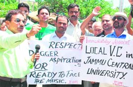 Members of the Jammu Central University Morcha stage a protest against delay in the appointment of the Vice-Chancellor of the Central University in front of the Divisional Commissioners office in Jammu on Thursday.