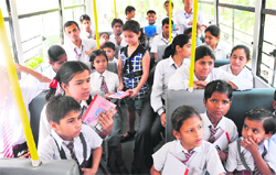 Chahat Bhandari (10) distributes notebooks and stationery items to underpreviliged students in Ludhiana.
