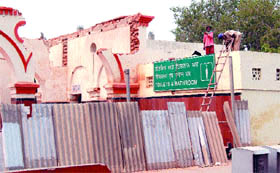 A view of the demolished roof of the waiting hall for general passengers and partially destroyed wall of the toilet, which has been closed for the public