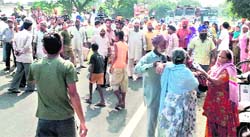 Villagers block the Ludhiana-Chandigarh road near Khant village, Fatehgarh Sahib, on Friday.