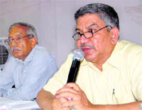 Vijay Talwar, Chairperson of the Uttarakhand Electricity Regulatory Commission, at a seminar in Dehradun on Friday