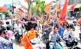 ABVP workers take out a two-wheeler rally in Dehradun on Friday