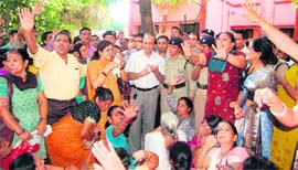 Dr AP Mamgai, Director Programmes of Uttarakhand Health Department being ghreored by ANMs in Dehradun on Wednesday.