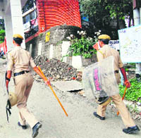 Cops patrolling on the HP University campus after a clash between activists of the ABVP and the SFI in Shimla on Friday.
