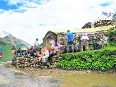 Tourists stranded at Gramphu on the way to Spiti, about 68 km from Manali.