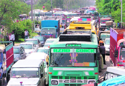 Vehicles stranded on the Jalandhar bypass after computer teachers blocked traffic 