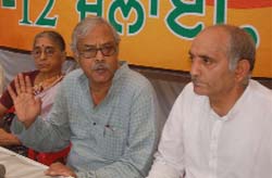 National general secretary of the CITU Tapan Sen (centre) accompanied by national secretary Dr Hem Lata and state secretary Raghunath Singh adresses media persons in Bathinda on Sunday. 
