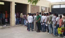 Students waiting for their turn to submit admission forms for BA part I at MR Government College, Fazilka