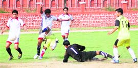 A match of the Dehradun Football League in progress at the Police Lines in Dehradun on Sunday.