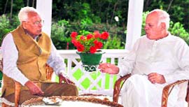 Union Minister Farooq Abdullah meets Governor NN Vohra at Raj Bhawan in Srinagar on Sunday.
