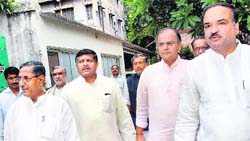 burying the hatchet: (R-L) BJP leaders Anant Kumar, Arun Jaitley and Ravi Shankar coming out after a meeting with Bihar Chief Minister Nitish Kumar (not in picture) in Patna on Sunday.