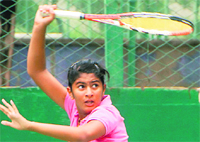 A player in action during the AITA Talent Series Tennis Tournament at the CLTA in Chandigarh 