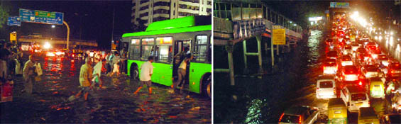Scenes of waterlogging and traffic jam at the ITO after heavy rain in New Delhi on Monday evening.