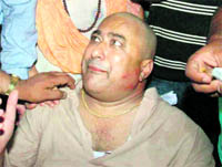 Kumar, MLA from Sahaspur, cries after the incident on Sunday night. 