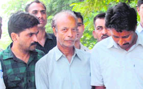The three accused arrested for allegedly helping Pakistani spy being produced at the district courts in Chandigarh on Tuesday.