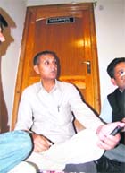 Former MLA Jagjivan Pal sitting in protest in front of the office of Rajni Patil, State Election Authority, at the Congress office in Shimla on Tuesday.