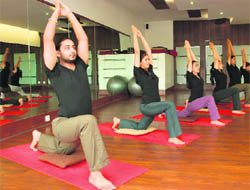 The business of being fit: Juneja at a yoga session in his fitness studio in Panchkula