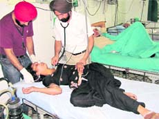 Manjit Kaur recuperates at a hospital in Ahmedgarh on Tuesday.